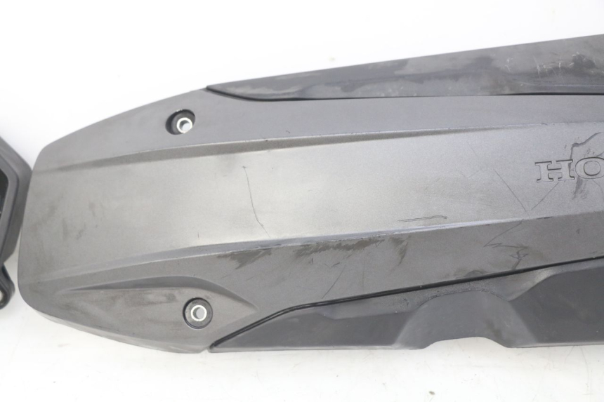 photo de TRANSMISSION COVER HONDA FORZA 125 (2015 - 2016) - Surface and material condition
