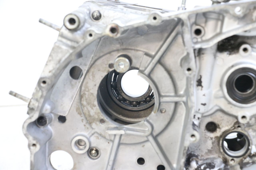 photo de Engine bottom case HYOSUNG GV AQUILA 125 (2000 - 2009) - Distinctive features