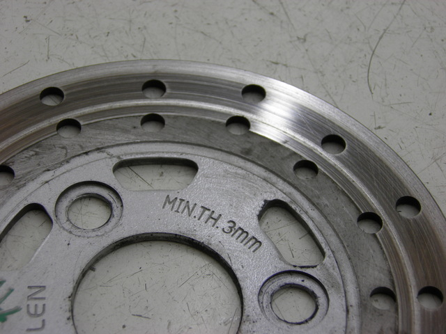 photo de FRONT BRAKE DISC QINGQI SPEEDY 50 (2005 - 2007) - Zoom on usage condition