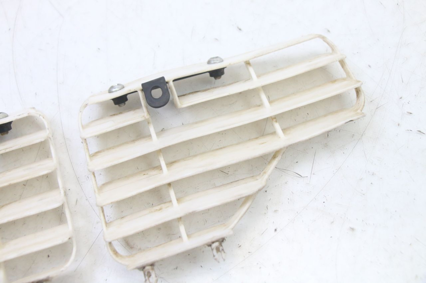 photo de RADIATOR COVER SMALL MX THUNDER 250 - Zoom on usage condition