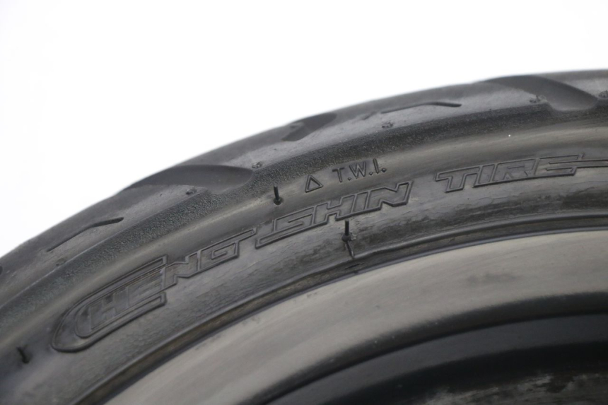 photo de FRONT RIM AND TIRE PEUGEOT KISBEE 2T 50 (2010 - 2017) - Additional view of the item