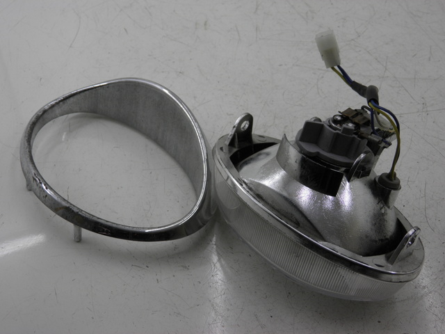 photo de FRONT HEADLIGHT APRILIA SCARABEO 100 (2003 - 2012) - Zoom on usage condition