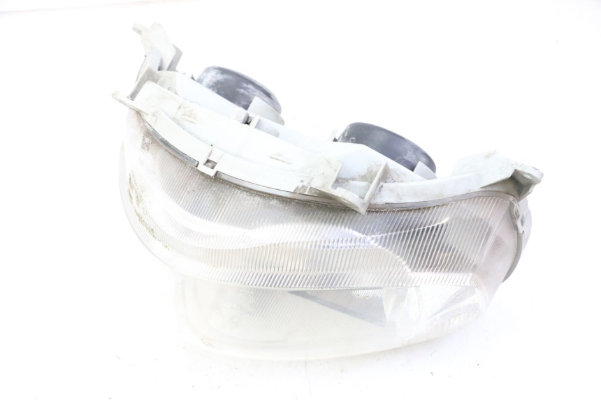 photo de FRONT HEADLIGHT SUZUKI BURGMAN 125 (2007 - 2014) - Surface and material condition