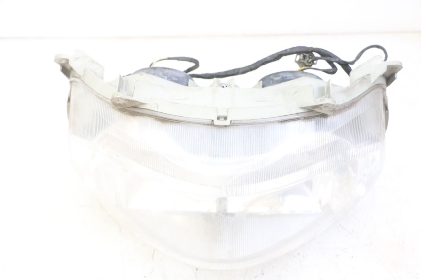 photo de FRONT HEADLIGHT SUZUKI BURGMAN 125 (2007 - 2014) - Surface and material condition