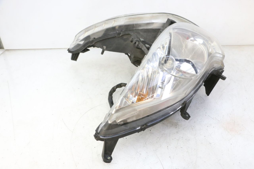 photo de FRONT HEADLIGHT HONDA FES S-WING SWING ABS 125 (2007 - 2015) - Surface and material condition