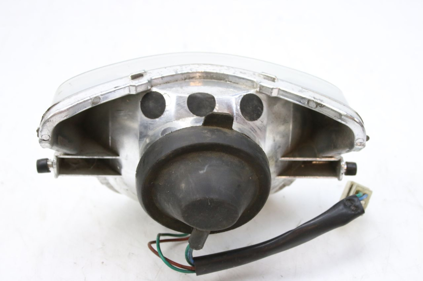 photo de FRONT HEADLIGHT PEUGEOT TWEET 125 (2010 - 2017) - Surface and material condition